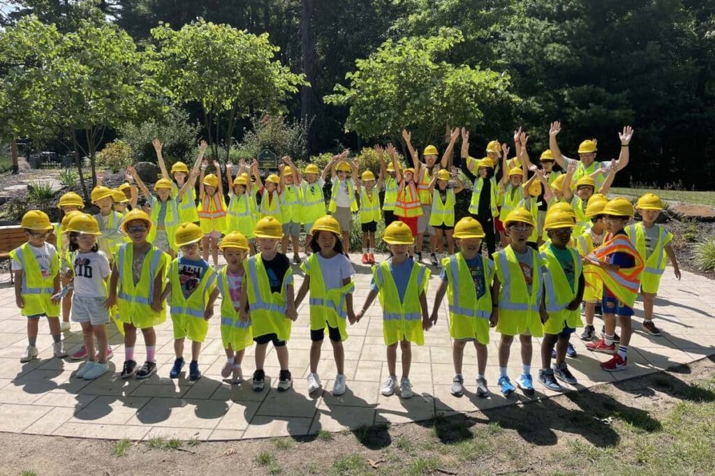 Campers jump for joy learning about the importance of safe drinking water through Veolia's educational outreach summer programs at the Haworth Water Treatment Plant in New Jersey. Courtesy of Veolia. 